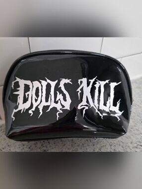 Dolls Kill Glossy Makeup Bag with White Graphic Text
